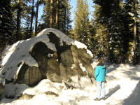 Debbie finds one of several big rocks that formed part of shelters used by others in the party.  This was more difficult to find than you'd imagine, what with the snow covering the paths.